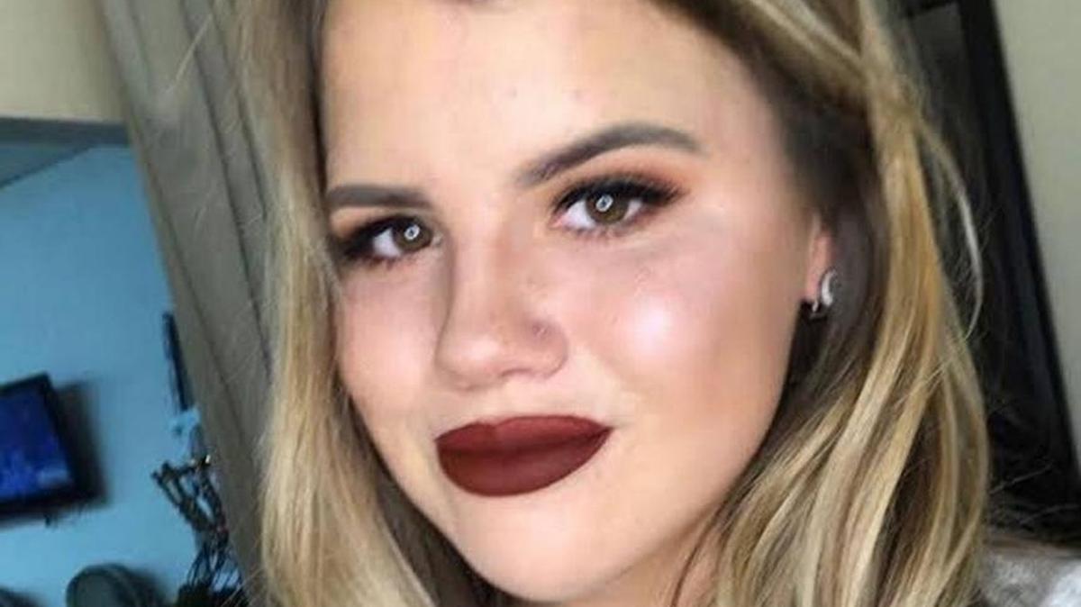 Bullard High School student Tyler Pafford poses with the nose piercing that got her kicked out of class.