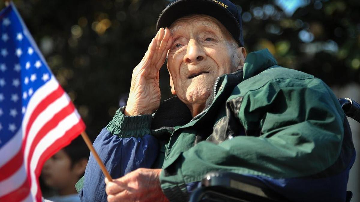 World War II Army Air Corps veteran Joseph Huerta of Clovis, 96, proudly salutes during the Veterans Day Parade held on Nov. 12, 2018.