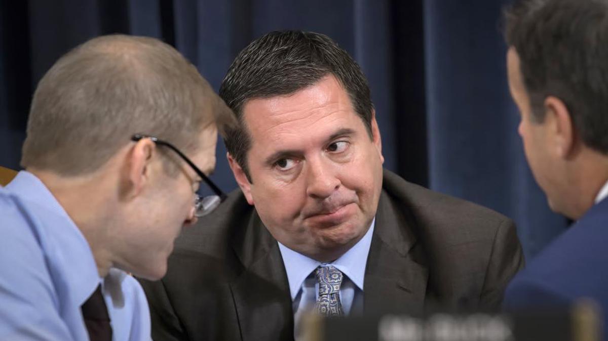 FILE - In this Dec. 9, 2019, file photo, Rep. Devin Nunes, center, R-Calif., the ranking member of the House Intelligence Committee; Rep. Jim Jordan, left, R-Ohio; and Rep. John Ratcliffe, R-Texas, talk during a break as the House Judiciary Committee considers the investigative findings in the impeachment inquiry against President Donald Trump, on Capitol Hill in Washington. Nunes represents California’s 22nd District in the Central Valley. California’s tarnished Republican Party is hoping to rebound in a handful of U.S. House races but its candidates must overcome widespread loathing for President Donald Trump and voting trends that have made the nation’s most populous state an exemplar of Democratic strength. (AP Photo/J. Scott Applewhite, File)