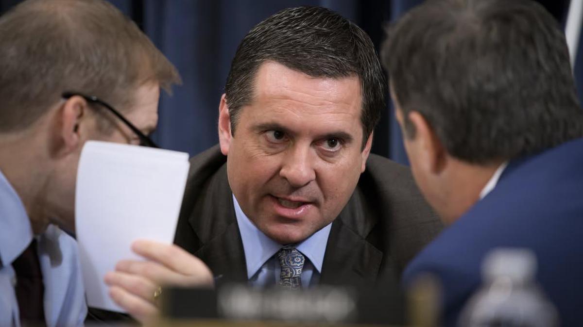 FILE - In this Dec. 9, 2019 file photo, Rep. Devin Nunes, R-Calif, the ranking member of the House Intelligence Committee, confers with Rep. Jim Jordan, R-Ohio, and Rep. John Ratcliffe, R-Texas, during a break as the House Judiciary Committee considers the investigative findings in the impeachment inquiry against President Donald Trump, on Capitol Hill in Washington. New documents released on Friday, Jan. 17, 2020, by House Democrats suggest that Nunes was more deeply involved than was previously known in efforts by allies of President Donald Trump to dig up dirt in Ukraine on former Vice President Joe Biden. (AP Photo/J. Scott Applewhite)