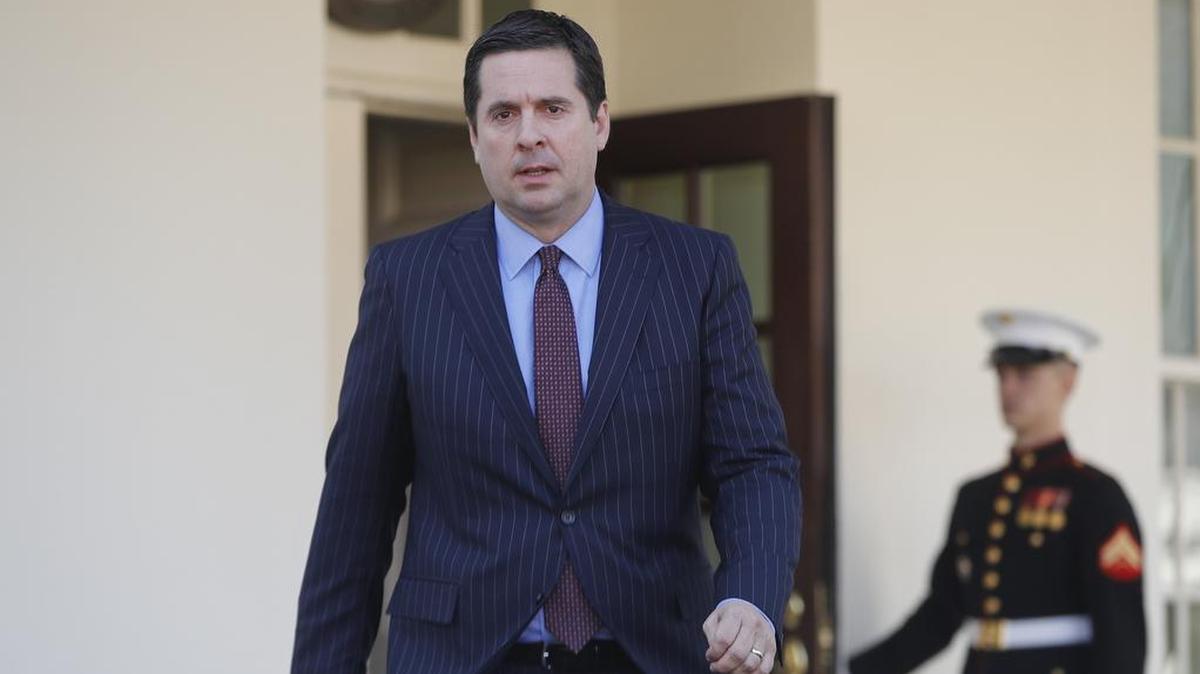 Then House Intelligence Committee Chairman Rep. Devin Nunes, R-Tulare, walks out the White House in Washington, Wednesday, March 22, 2017, to speak with reporters after a meeting with President Donald Trump.