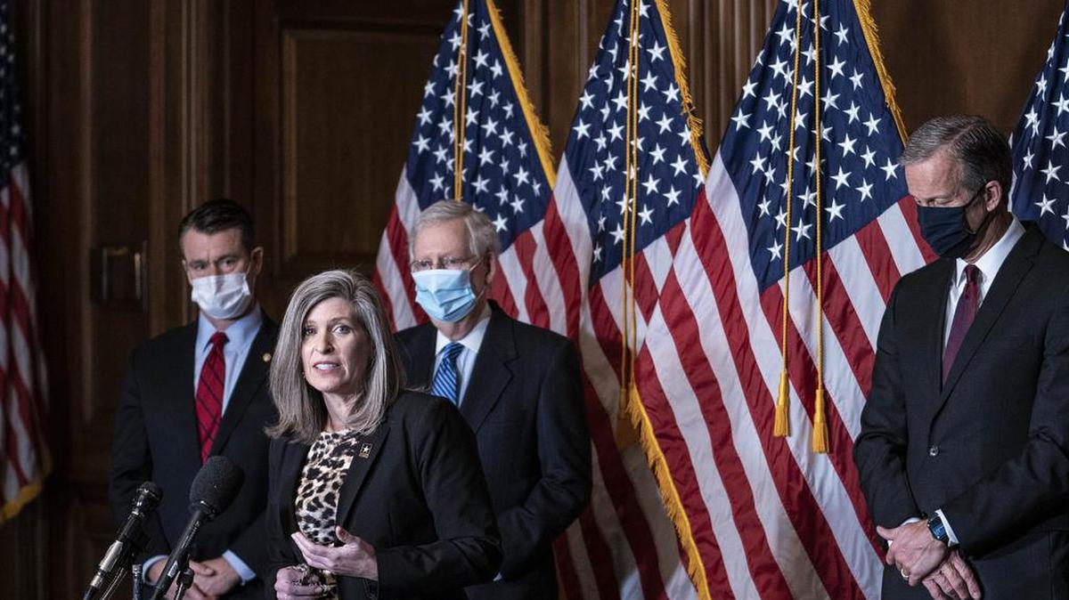 Sen. Joni Ernst, R-Iowa, speaks during a news conference following a weekly meeting with the Senate Republican caucus, Tuesday, Dec. 8. 2020 at the Capitol in Washington.