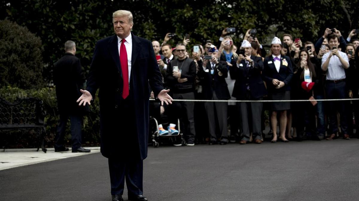 President Donald Trump gestures towards reporters outside the White House as he departs for New Orleans on Monday, Jan. 13, 2020.