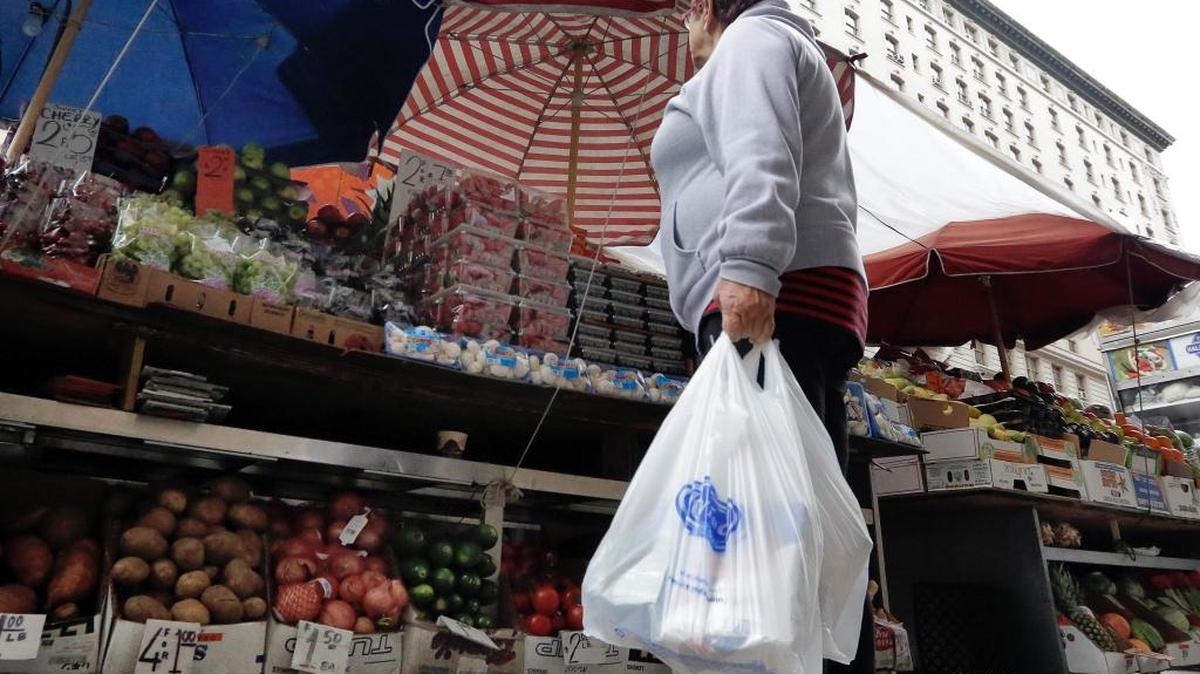 Some stores must charge for plastic bags in California.