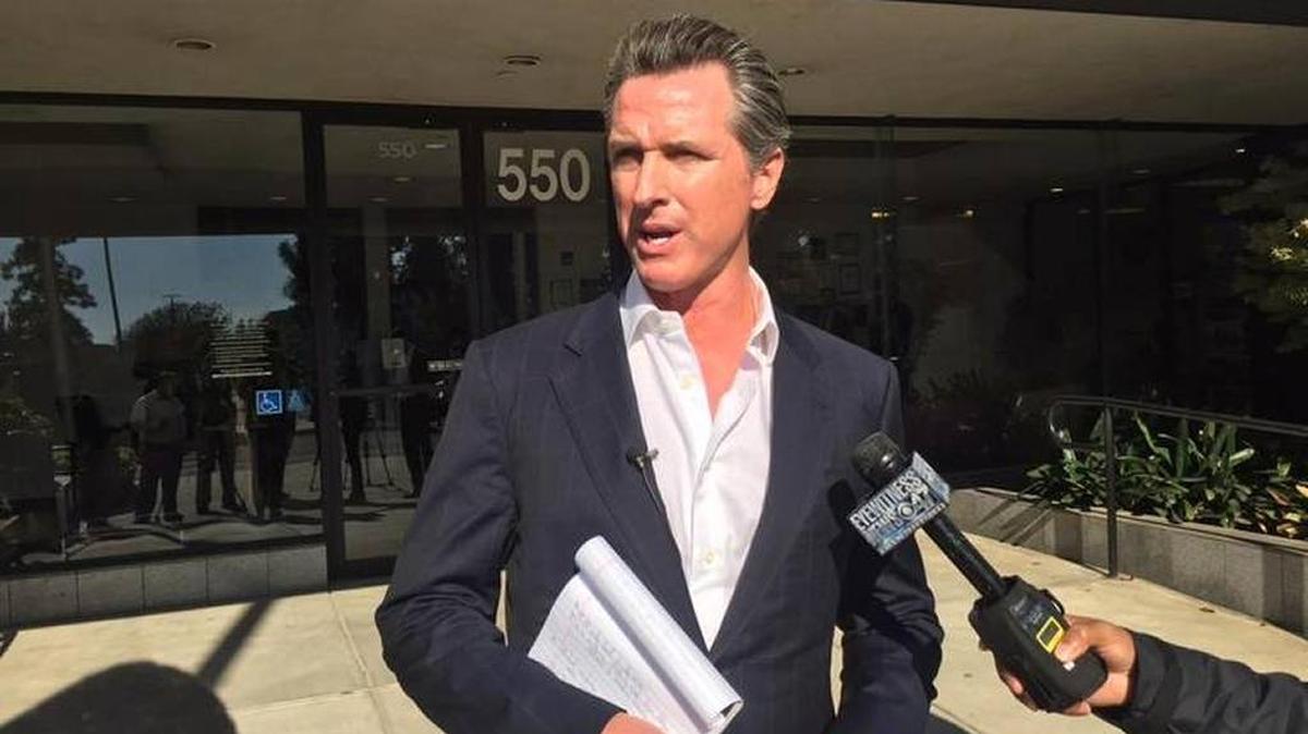 Lt. Gov. Gavin Newsom answers reporters’ questions in Fresno on Nov. 29, 2017.