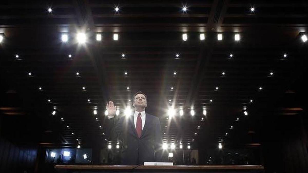 Former FBI director James Comey is sworn in during a Senate Intelligence Committee hearing on Capitol Hill, June 8, 2017, in Washington.