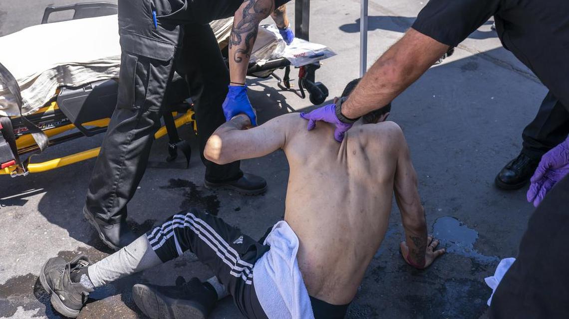 In this June 26 photo, Salem, Oregon paramedics respond to a heat exposure call at a cooling center during a heat wave. A preliminary report found the majority of those who perished in the Pacific Northwest’s record-smashing heat wave were white, male, older and socially isolated.