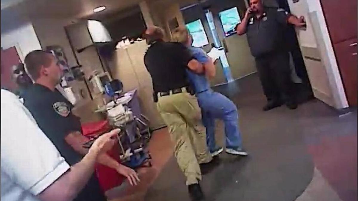A video shows Salt Lake City Detective Jeff Payne taking nurse Alex Wubbels out of the hospital.