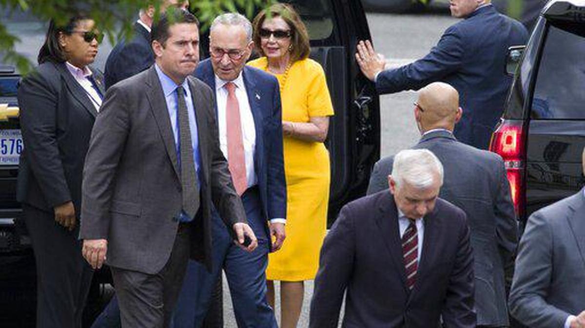 Rep. Devin Nunes, R-Tulare, the ranking member of the House Intelligence Committee, second from left, departs from a June 20 meeting with President Trump. Also with Nunes are Senate Minority Leader Chuck Schumer of N.Y., House Speaker Nancy Pelosi of Calif., Sen. Jack Reed, D-R.I., foreground, and others.