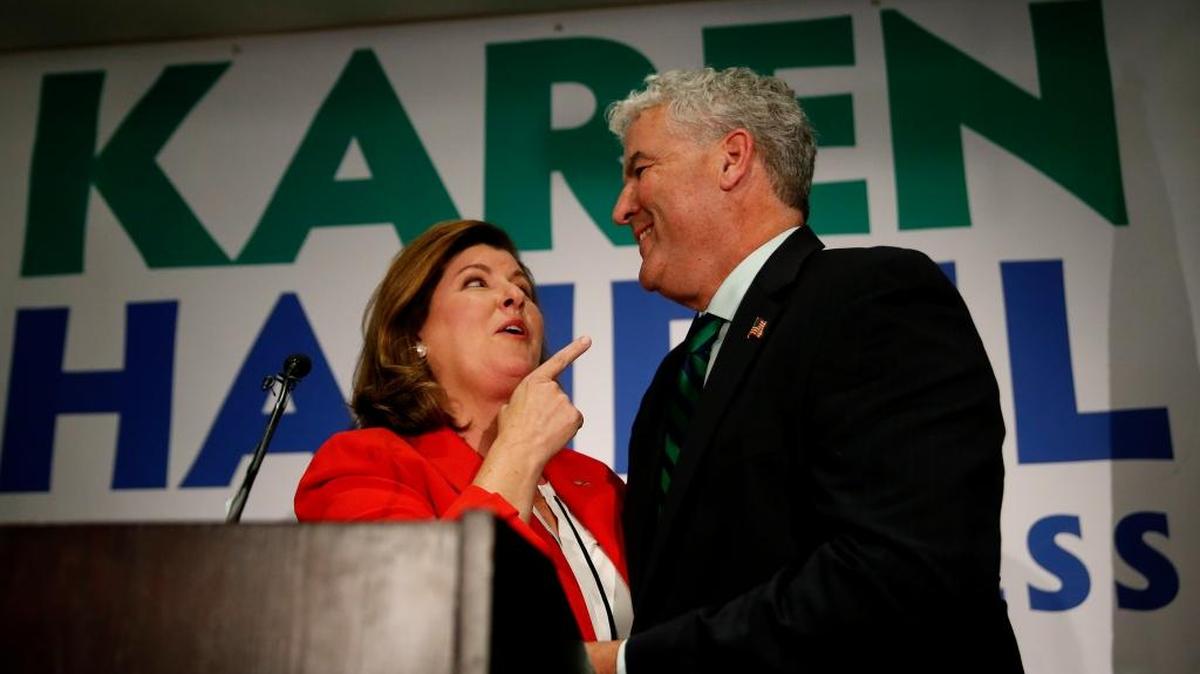 It has been close but not cigar for Democrats in House special elections. Here Republican candidate for Georgia’s Sixth District congressional seat Keran Handel stands with her husband Steve as she declares victory during an election-night watch party June 20, 2017, in Atlanta.