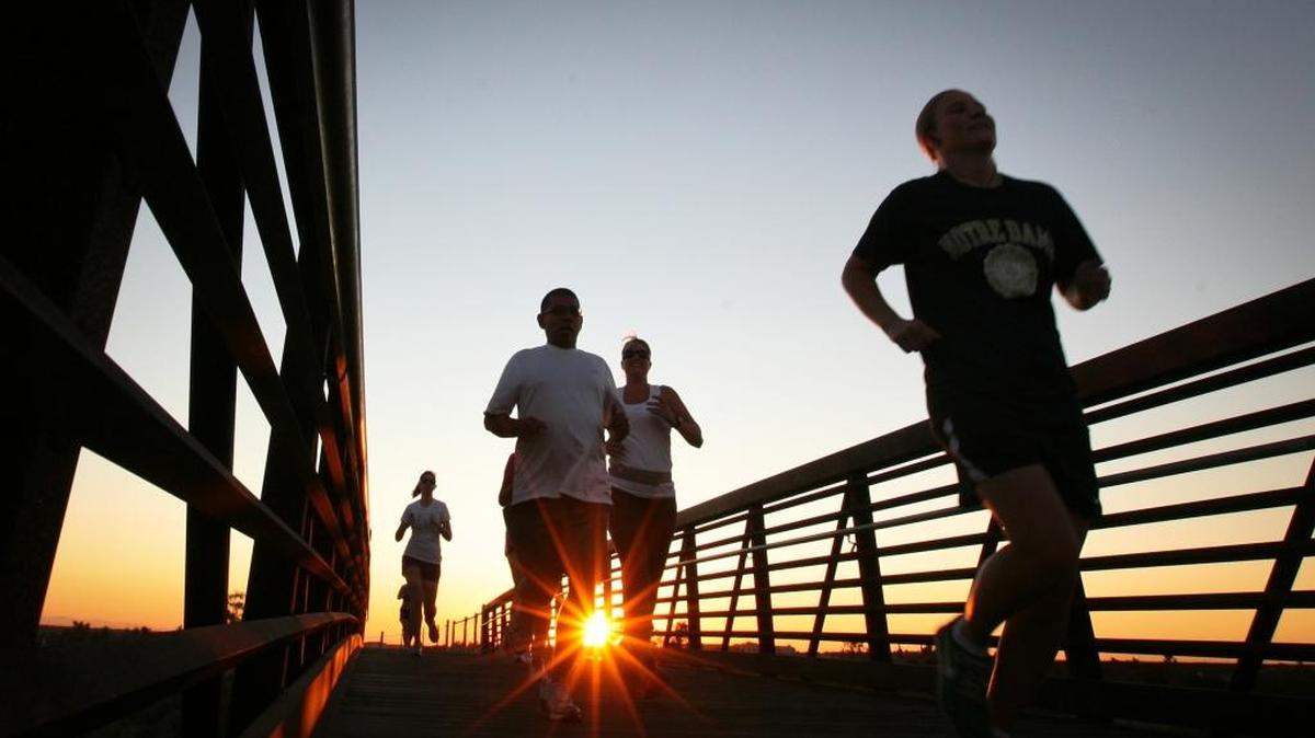 Runners cross the Rice Road bridge on the Eaton Trail near Friant Road. The multipurpose trail is part of the long-envisioned San Joaquin River Parkway, which would get a major boost by a bill propsed by Assemblyman Joaquin Arambula.