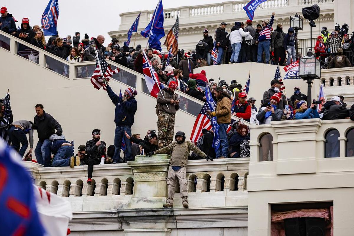 Pro-Trump supporters storm the U.S. Capitol following a rally with President Donald Trump on Wednesday, Jan. 6, 2021 in Washington, D.C. (Samuel Corum/Getty Images/TNS)