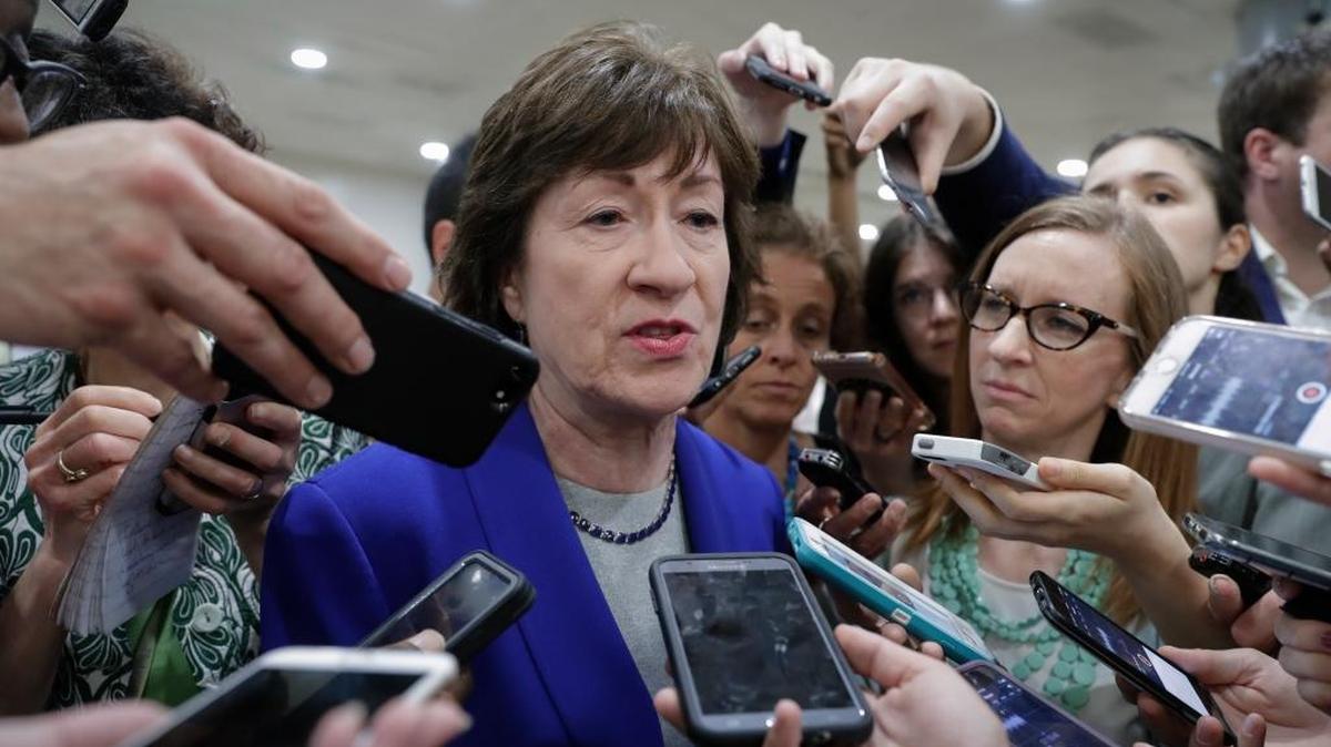 Sen. Susan Collins, R-Maine, speaks amid a crush of reporters after Republicans released their long-awaited bill to scuttle much of President Barack Obama's Affordable Care Act on Thursday, June 22, 2017. She is one of four GOP senators to say they are opposed to it as written, which could put the measure in immediate jeopardy.