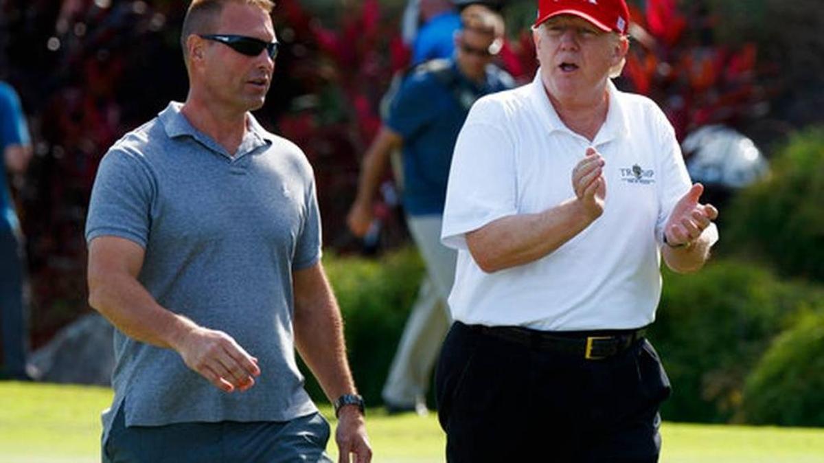President Donald Trump walks with Gene Gibson, commanding officer at Coast Guard Station Lake Worth Inlet, as he arrives to meet with members of the U.S. Coast Guard, who he invited to play golf, at Trump International Golf Club, in West Palm Beach, Fla. Now that a doctor’s report lists him physically and cognitively well, Diane Woody of Fresno says he has no excuse for his bizarre behavior.