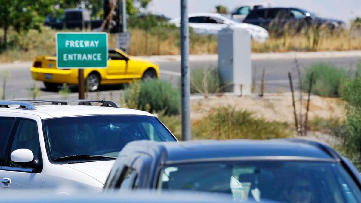 Traffic merges onto southbound 41 at McKinley Avenue on and off- ramp Wednesday, July 8, 2015 in Fresno, Calif.