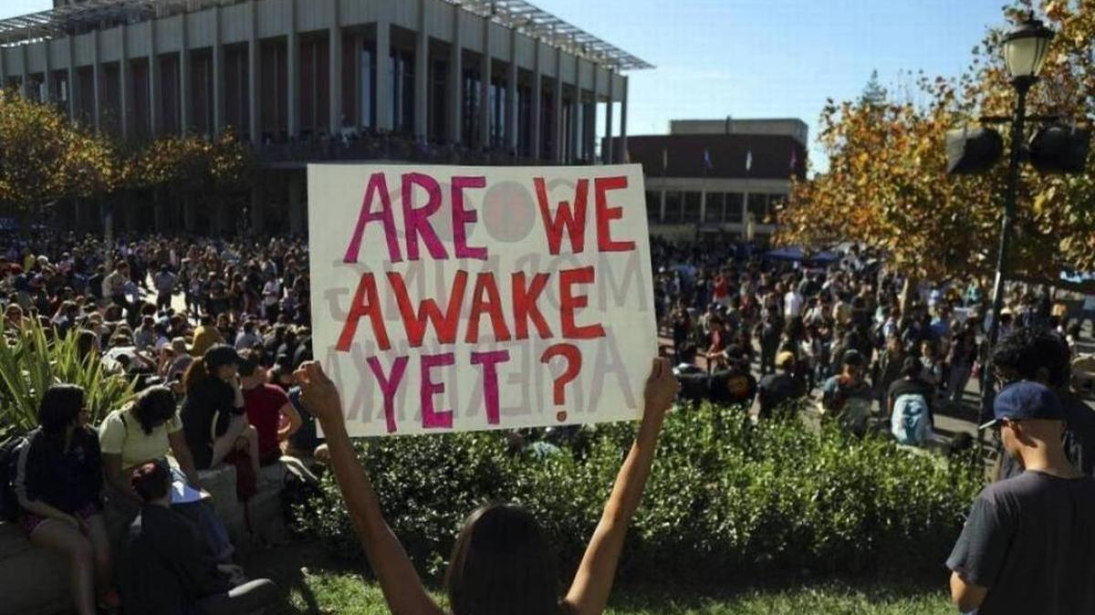 High school and college students protest the election of Donald Trump at the University of California, Berkeley, Nov. 9. Despite improved turnout in the presidential election, only 53 percent of California millennials are registered to vote.