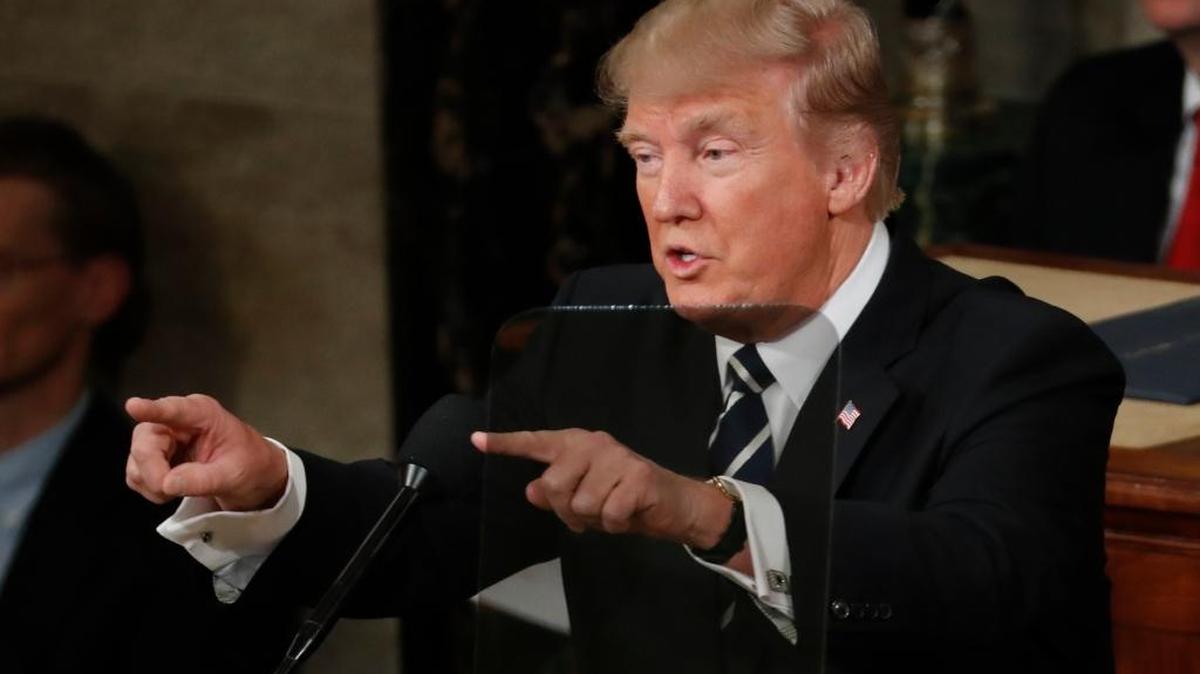 President Donald Trump gestures as he addresses a joint session of Congress on Capitol Hill on Feb. 28, 2017.