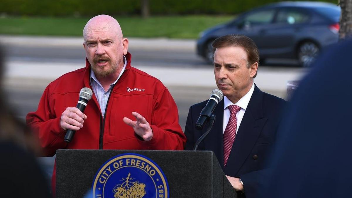 Fresno City councilmen Steve Brandau, left, speaks to the media about a perceived class warfare building over the gas tax while councilman Garry Bredefeld shows support during a press conference in 2019 in Fresno. The two may compete against each other next year for county supervisor.