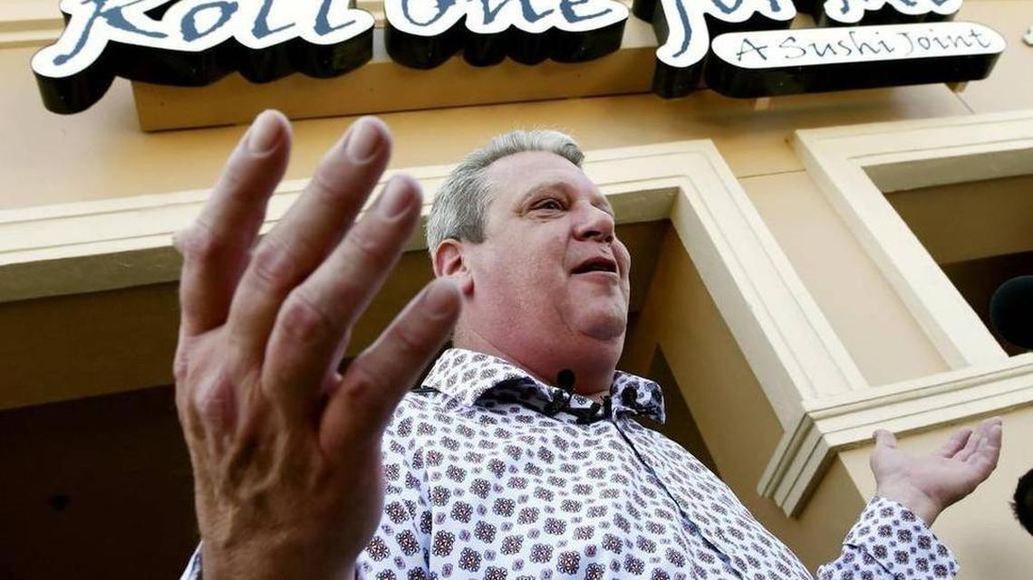 Steve Wayte, owner of Roll One For Mi, a sushi restaurant in northeast Fresno, addresses the media over comments he made on Facebook during a press conference outside the business March 12 in Fresno.