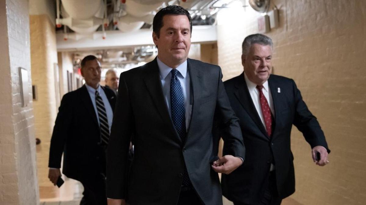 In this Feb. 6, 2018, file photo, House Intelligence Committee Chairman Devin Nunes, R-Tulare, walks with Rep. Peter King, R-N.Y., also a member of the Intelligence Committee, at the Capitol in Washington.
