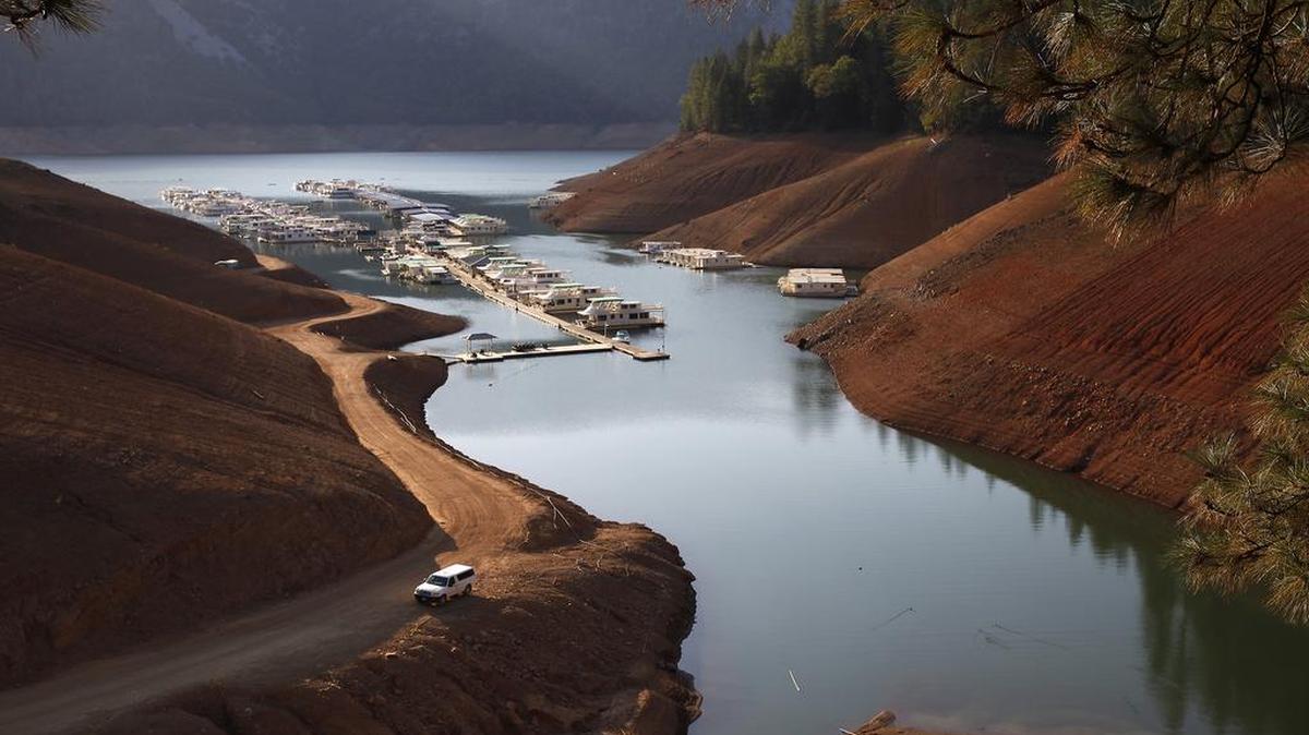 Docks at a marina in Lake Shasta have been moved farther and farther away from the shoreline resorts as the drought drags on. Less visible but more devastating is the damage to native fish that struggle for survival, even in good weather.