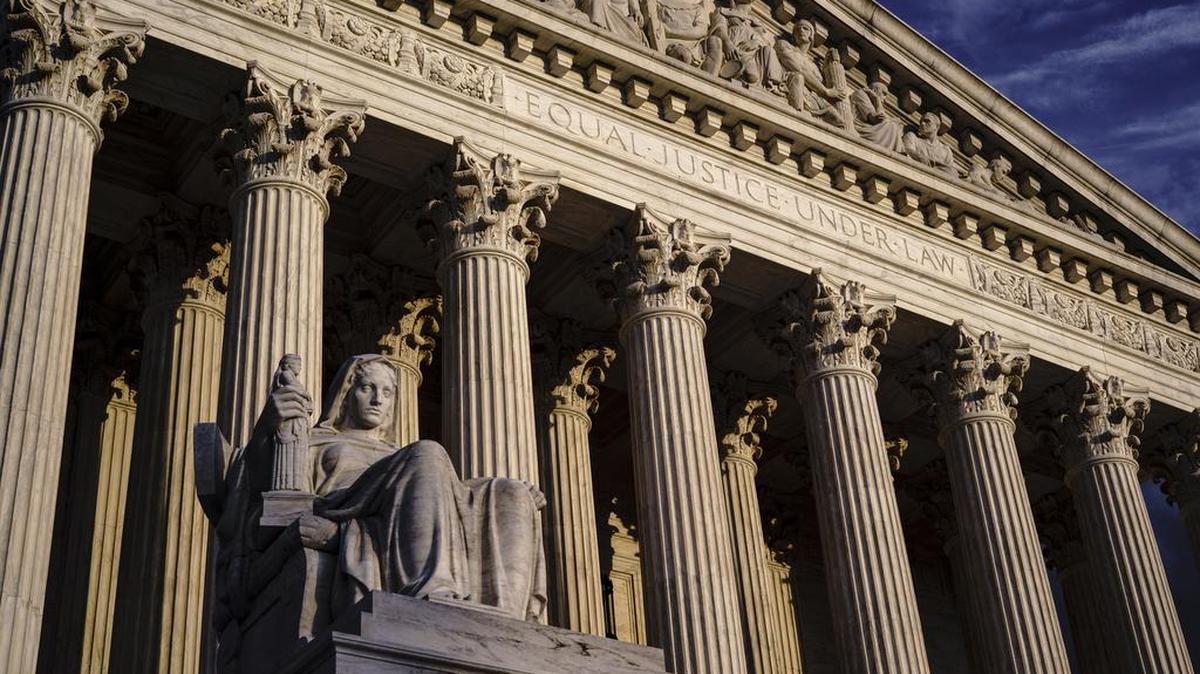 FILE - The Supreme Court is seen at dusk in Washington, Oct. 22, 2021
