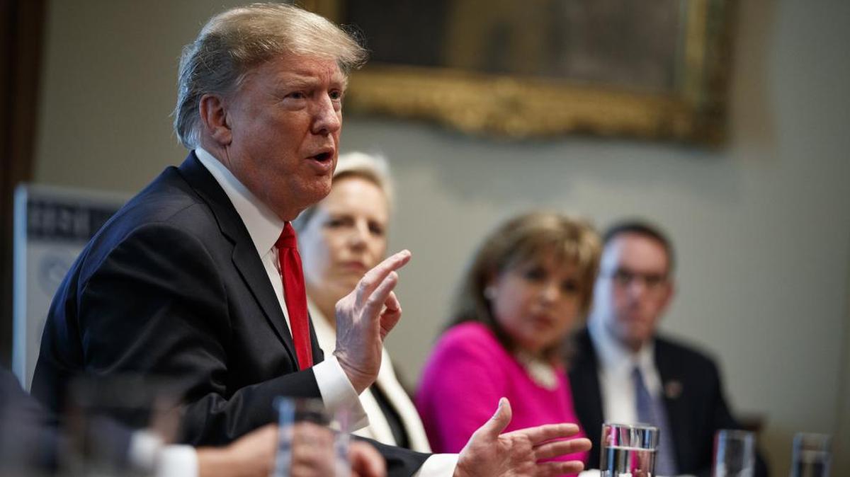 President Donald Trump speaks during an event on human trafficking in the Cabinet Room of the White House, Friday, Feb. 1, 2019, in Washington.