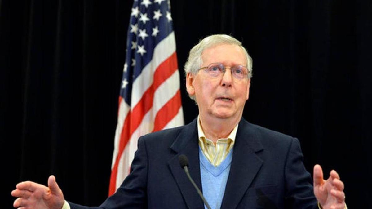 Senate Majority Leader Mitch McConnell, R-Ky., answers a reporter’s question during a news conference Saturday in Louisville, Ky. The Senate passed the tax bill early Saturday morning with a 51-49 vote.