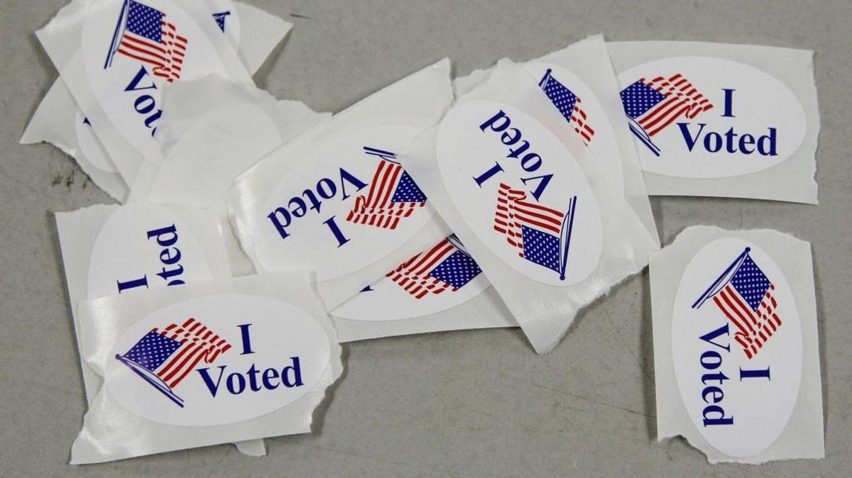 Voters get a sticker to encourage others to vote.