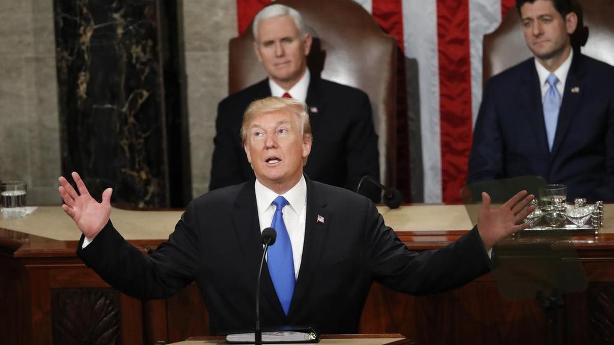 In this Jan. 30, 2018 photo, President Donald Trump delivers his State of the Union address to a joint session of Congress on Capitol Hill. Trump will present his rescheduled State of the Union address Tuesday, Feb. 5, after a wrenching government shutdown and with the battle over border wall funding still unresolved.