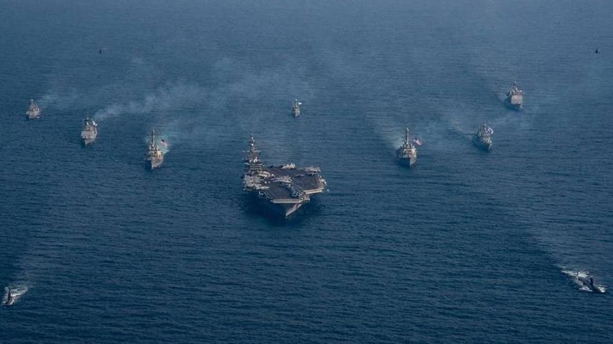 The USS Carl Vinson, as shown in an aerial photo, has several hundred people from Lemoore NAS on board. The aircraft carrier has been ordered to the Korean peninsula.