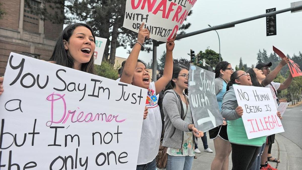 Students and supporters gather Tuesday to protest President Donald Trump's decision to end the Deferred Action for Childhood Arrivals (DACA) program. This was the second of two rallies at the courthouse in Mount Vernon protesting the DACA decision.