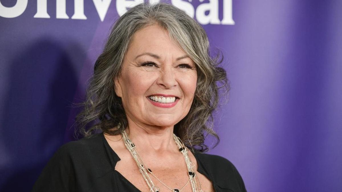 In this April 2014 file photo, Roseanne Barr arrives at the NBC Universal Summer Press Day in Pasadena, Calif. The unprecedented sudden cancellation of ABC’s top comedy “Roseanne” has left a wave of unemployment and uncertainty in its wake.