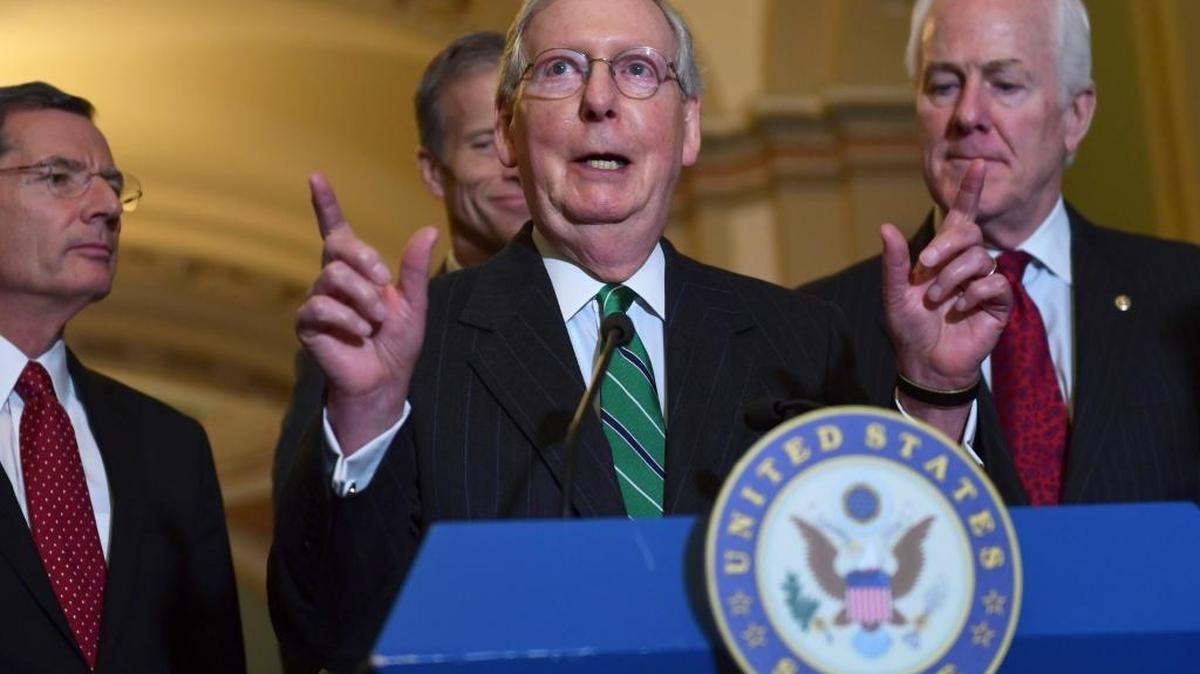Senate Majority Leader Mitch McConnell of Ky., second from right, speaks to reporters following the weekly Republican policy luncheon on Capitol Hill in Washington, Tuesday. Joining McConnell are from left, Sen. John Barrasso, R-Wyo., Sen. John Thune, R-S.D., and Sen. John Cornyn, R-Texas.