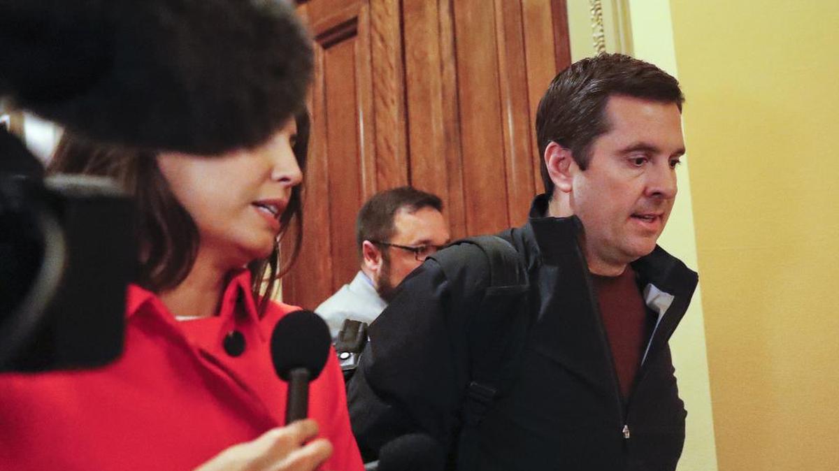 House Intelligence Committee Chairman Rep. Devin Nunes, R-Tulare, is pursued by reporters as he leaves Capitol Hill in Washington, Thursday, April 6, 2017, after meeting with House Majority Leader Kevin McCarthy of Bakersfield.