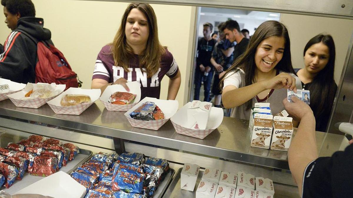 Students line up at the lunch counter at Clovis East High School Thursday, April 7, 2016.