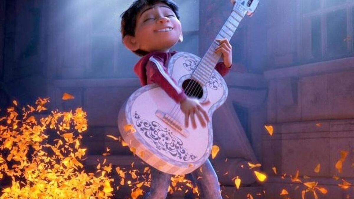 Miguel (voiced by Anthony Gonzalez) has a dream to make music, in Pixar’s new “Coco.”