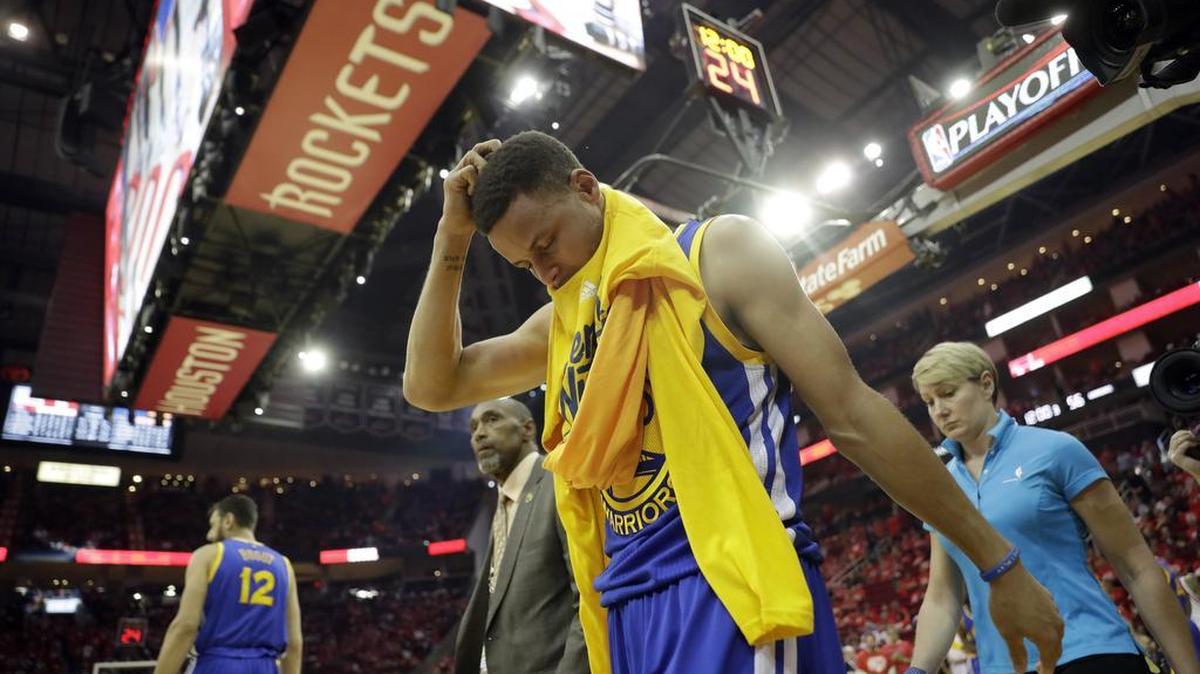 Stephen Curry of the Warriors heads off the court and to the locker room at the start of the second half in Game 4 of their first-round playoff series against the Rockets on Sunday, April 24, 2016, in Houston. Curry was injured at the end of the first half.
