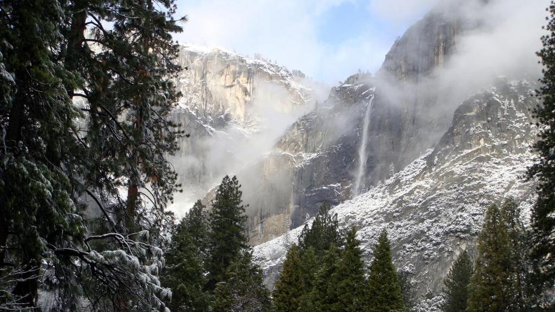 Yosemite Falls flows following a February 2012 storm that dropped an inch of snow in Yosemite Valley and about 9 inches at Badger Pass. Yes, you can still call it Yosemite but the National Park Service has announced it is changing names of some of the park’s best-known man-made landmarks in a trademark dispute with ousted concessionaire Delaware North.