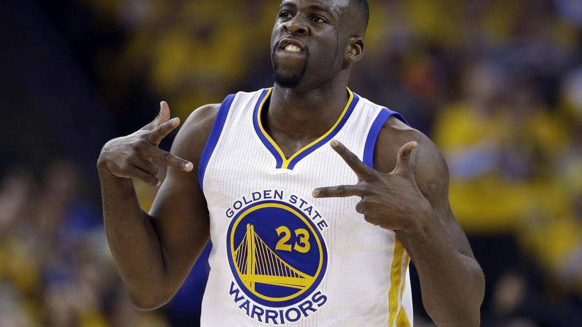 The Golden State Warriors’ Draymond Green celebrates after scoring against the Houston Rockets during the first half in Game 5 of a first-round NBA basketball playoff series Wednesday, April 27, 2016, in Oakland, Calif.