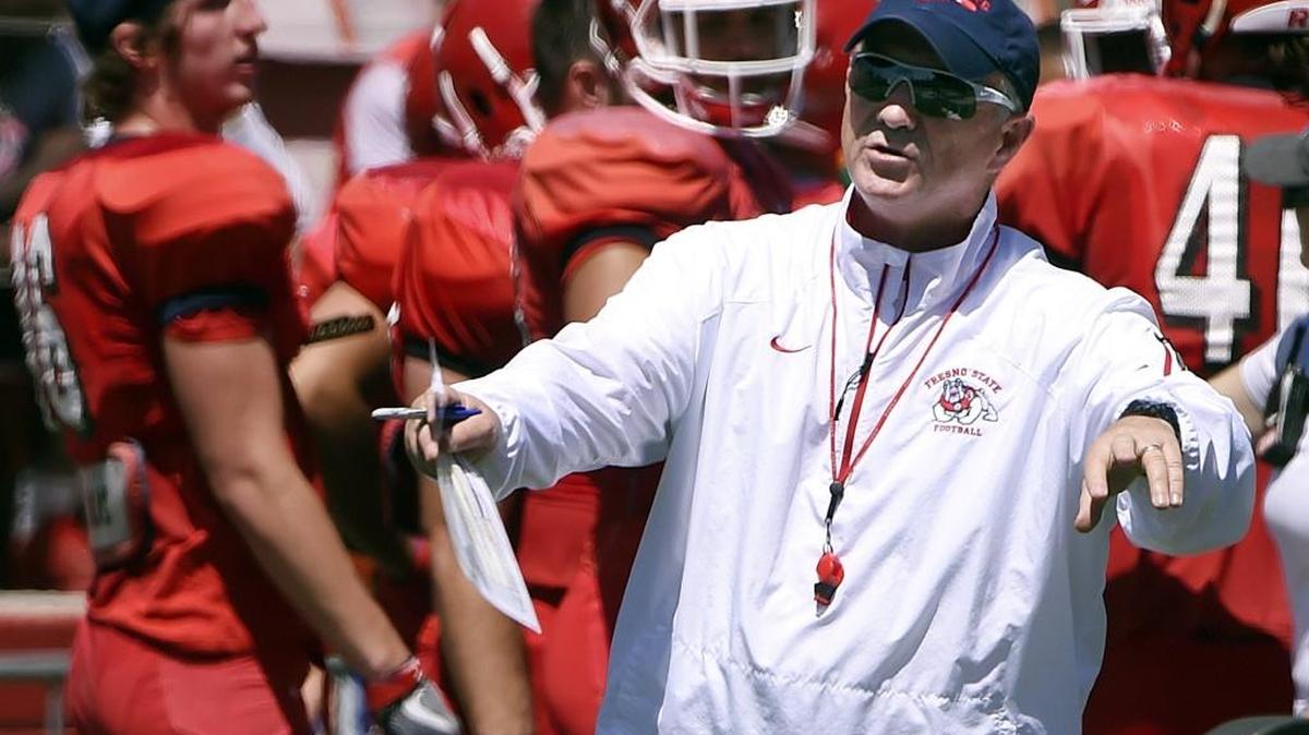 Fresno State head football coach Jeff Tedford calls out instructions during the team’s Spring Preview on April 29 at Bulldog Stadium. Fall camp begins Aug. 1 in anticipation of the Sept. 2 season opener.