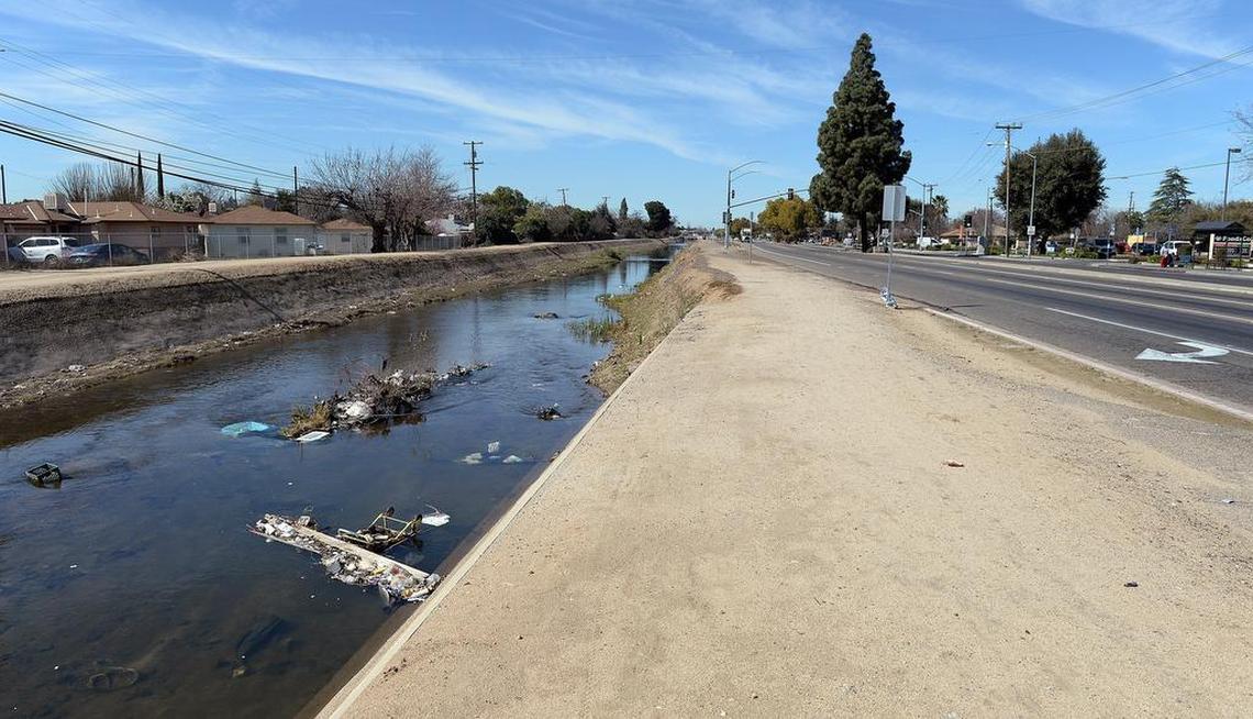 This canal bank at Shields and First Street shows where the first part of the Midtown Trail was slated for construction during a June 2016 ribbon-cutting ceremony. As of March 2018, the bike path has yet to be constructed.