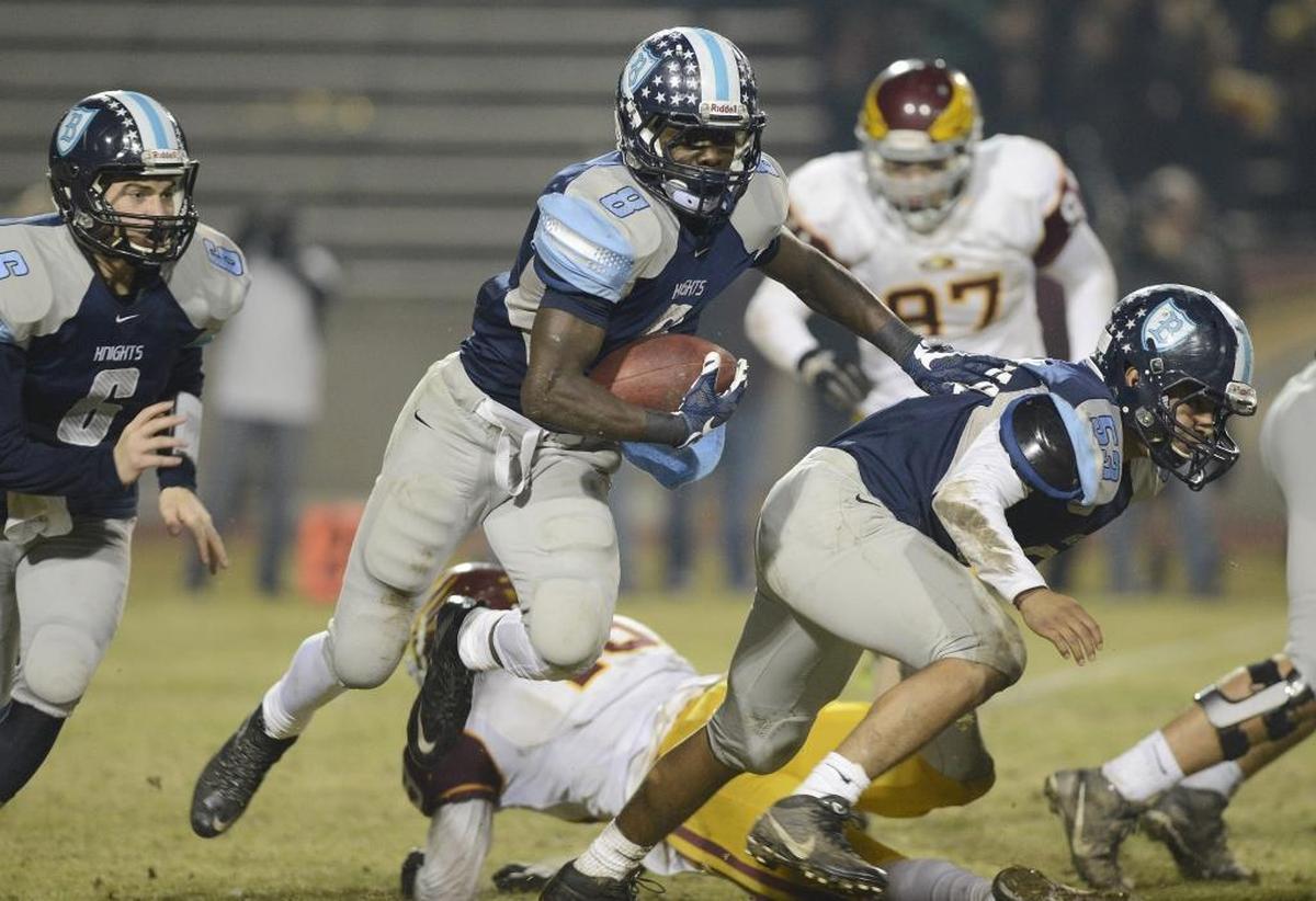 Bullard’s Charles Williams, shown here in the 2015 playoffs against Clovis West, did not receive a scholarship offer or much love from Fresno State despite a 2,100-yard, 28-touchdown senior season.