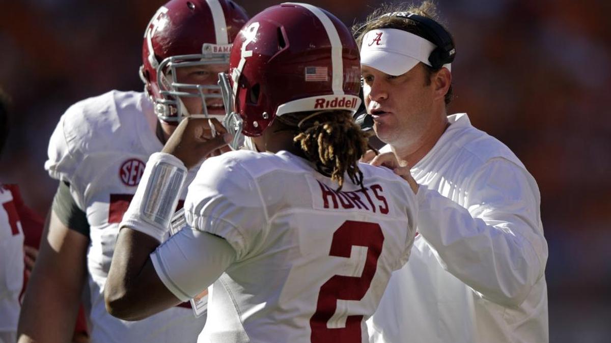 Alabama offensive coordinator Lane Kiffin, right, did express interest in becoming head coach at Fresno State, according to Fresno Bee columnist Marek Warszawski. It’s just that Fresno State athletic director Jim Bartko had more interest in Jeff Tedford.