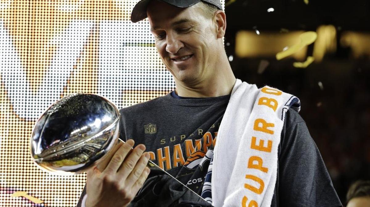 Denver quarterback Peyton Manning soaks in the moment with the Lombardi Trophy after Super Bowl 50 on Sunday in Santa Clara. The Broncos beat the Panthers 24-10.