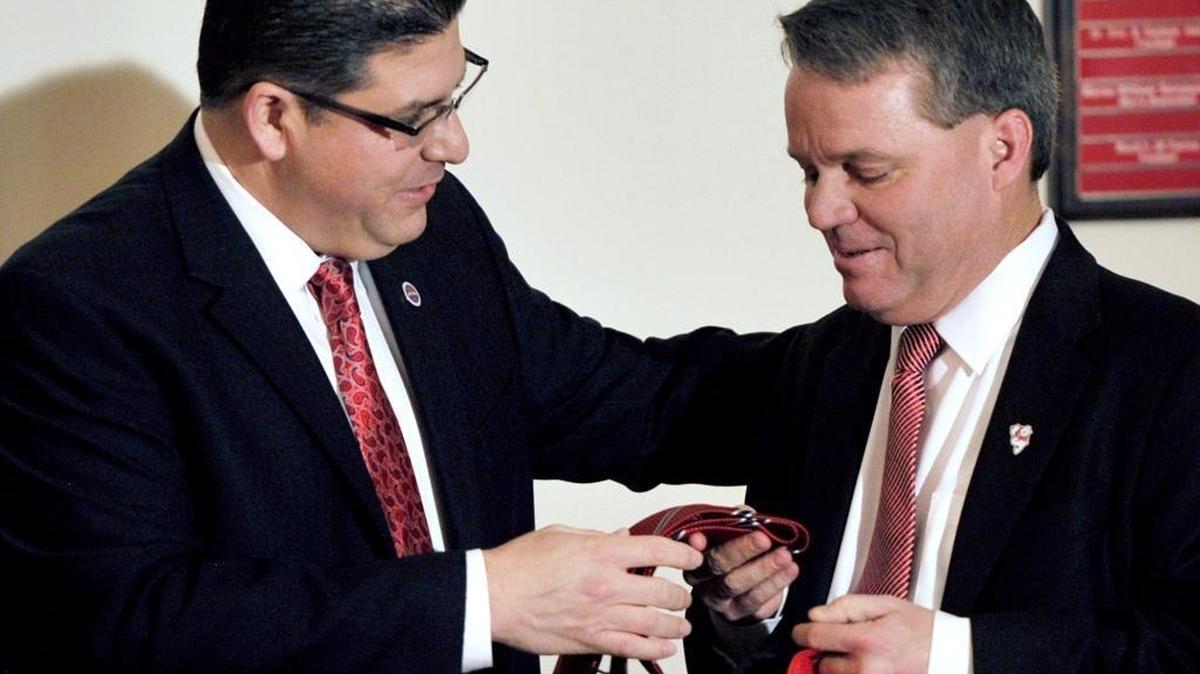 
Fresno State athletic director Jim Bartko, right, has his hands full with welcome gifts from President Joseph Castro on the day of his official hiring in November 2014. Now Bartko’s hands are full with what to do about the football team’s 1-5 start.
