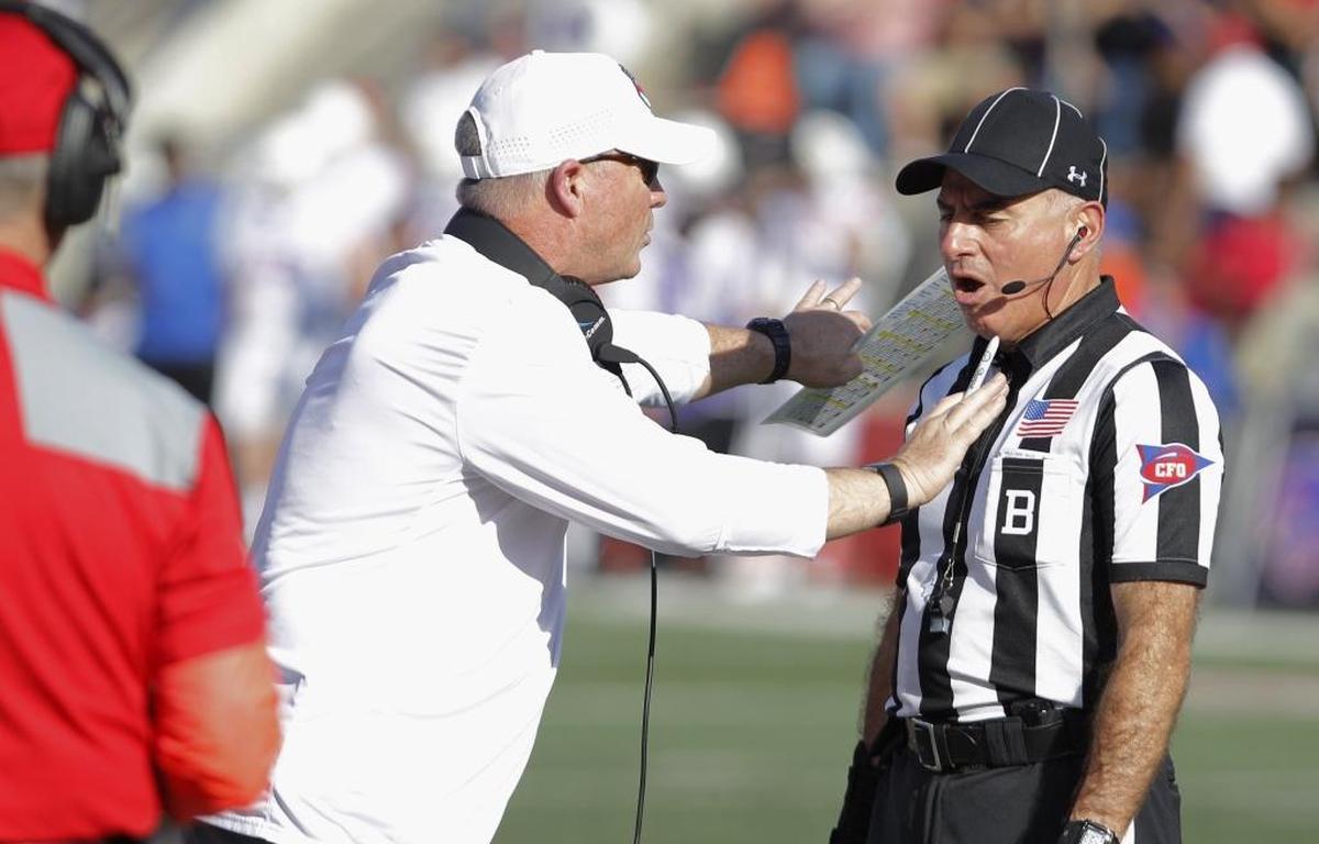 Fresno State coach Jeff Tedford pleads for a call during Saturday’s game against Boise State.