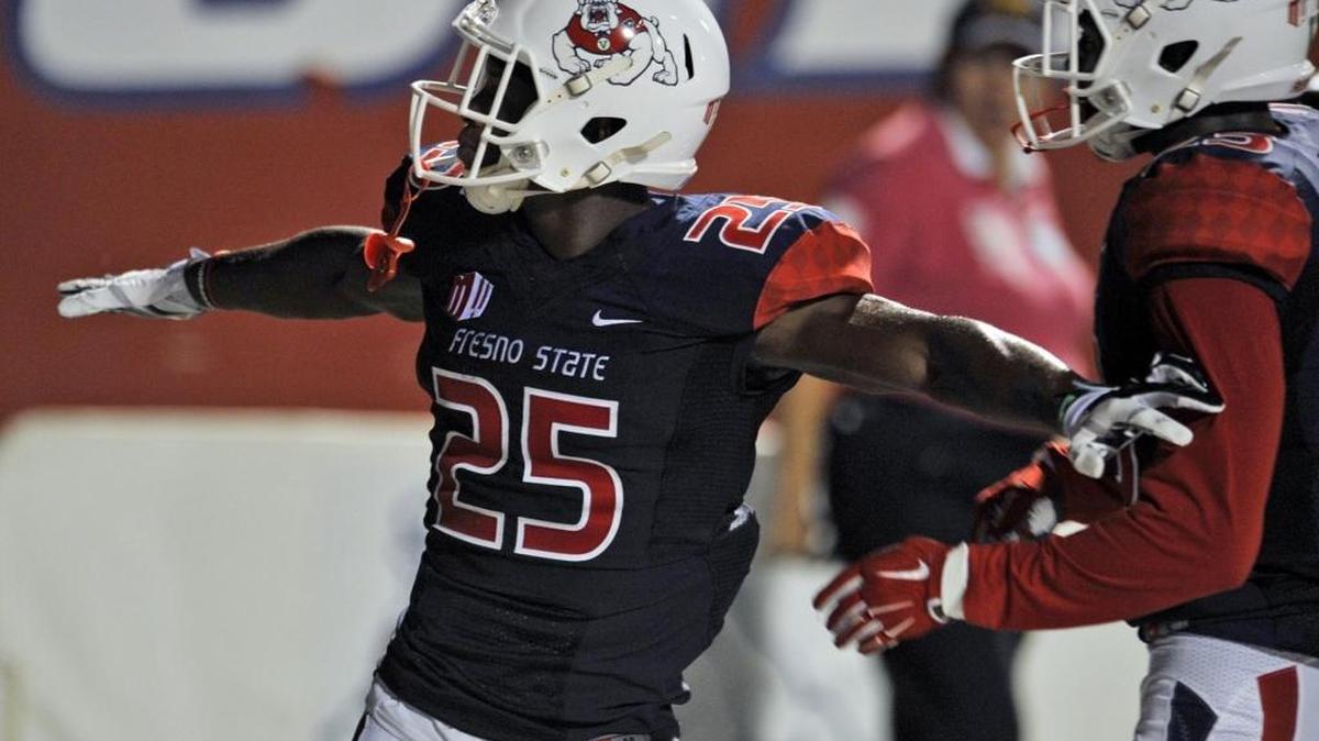 Fresno State cornerback Tyquwan Glass, signaling an incomplete pass during last season’s game against UNLV, is one of the few Bulldogs to receive any preseason All-Mountain West Conference consideration.