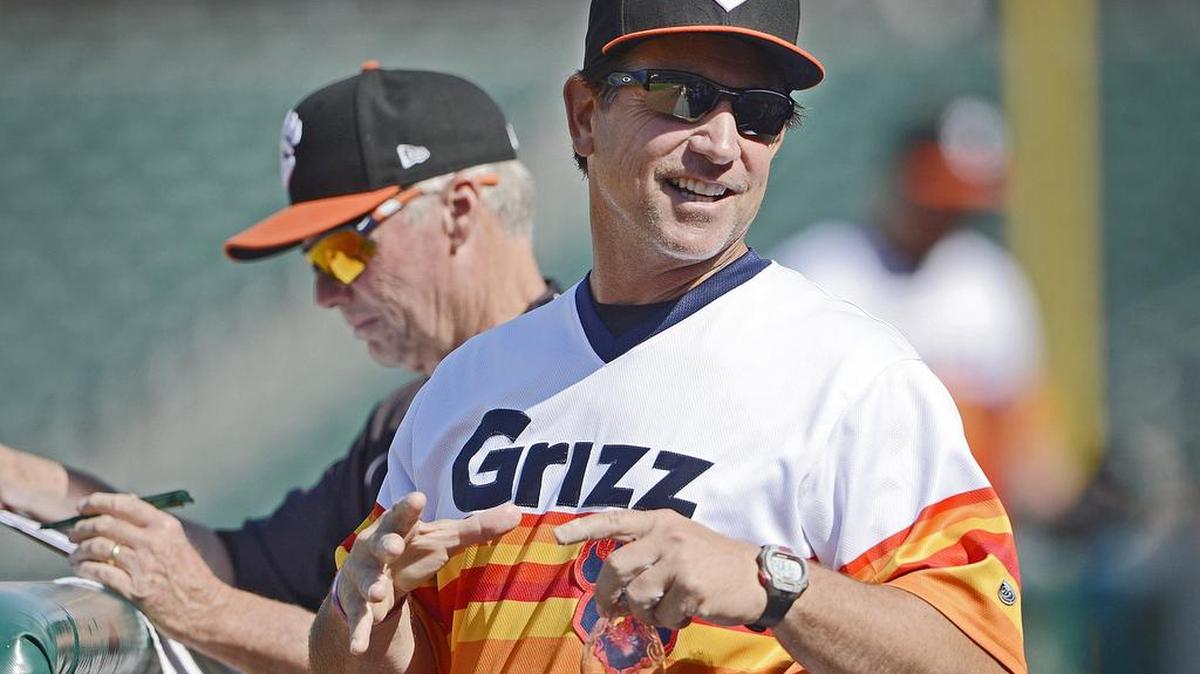 Fresno Grizzlies manager Tony DeFrancesco smiles at a fan during their game against El Paso at Chukchansi Park Saturday, July 19, 2015.