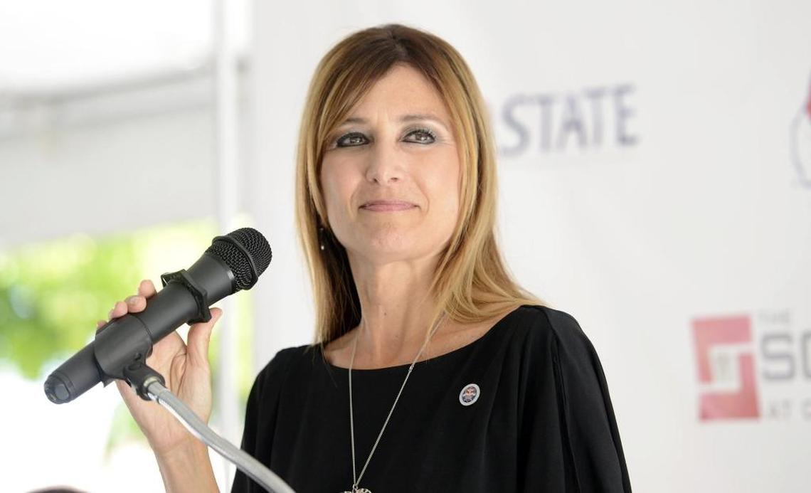 Debbie Adishian-Astone, former Fresno State vice president for administration and CFO, gives the welcome message during the grand opening of The Square at Campus Pointe on Friday, July 17, 2015.